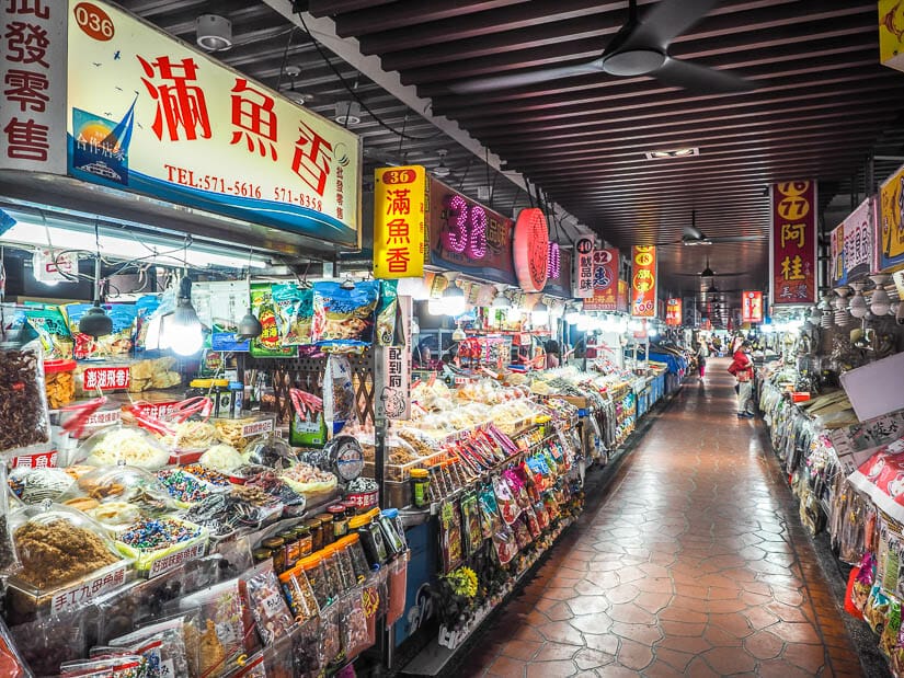Rows of stalls selling dried seafood and other souvenirs in Cihou Market, Cijin