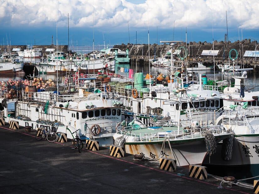 A dense collection of white boats in Dafu Harbor, Xiaoliuqiu