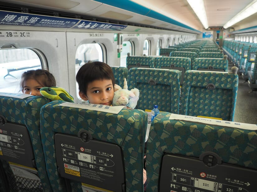 Two kids on the high speed rail in Taiwan