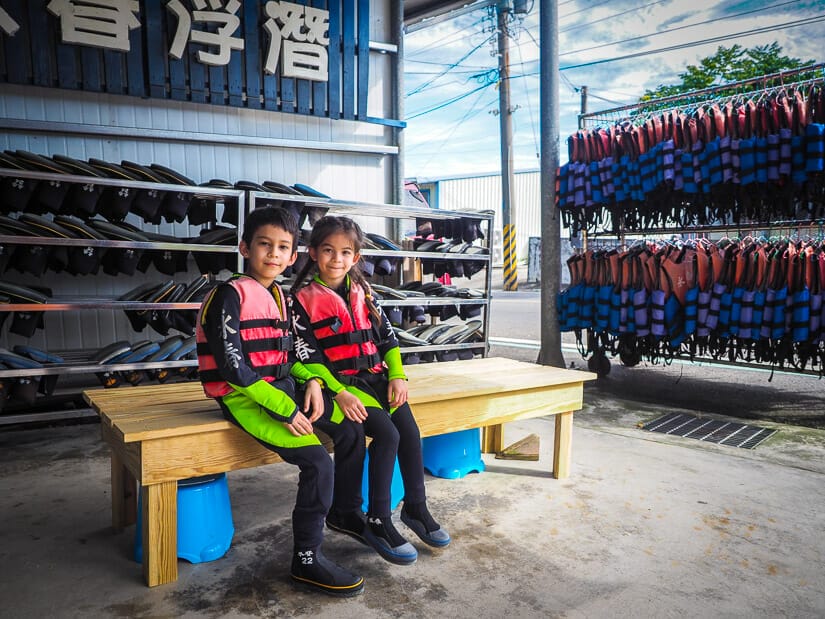 Two kids in snorkelling gear on Xiaoliuqiu