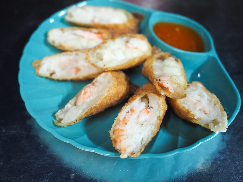 A plate of deep fried Thai shrimp rolls