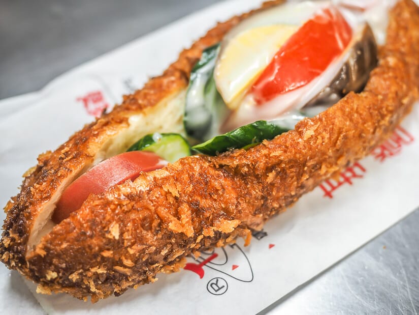 Close up of a deep fried sandwich, or nutritious sandwich, a famous food from Keelung Night Market