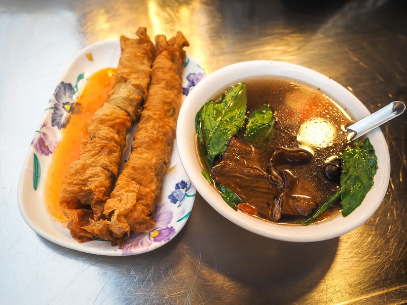 Two vegetarian things to eat at Keelung Night Market: sticky rice rolls and herbal soup