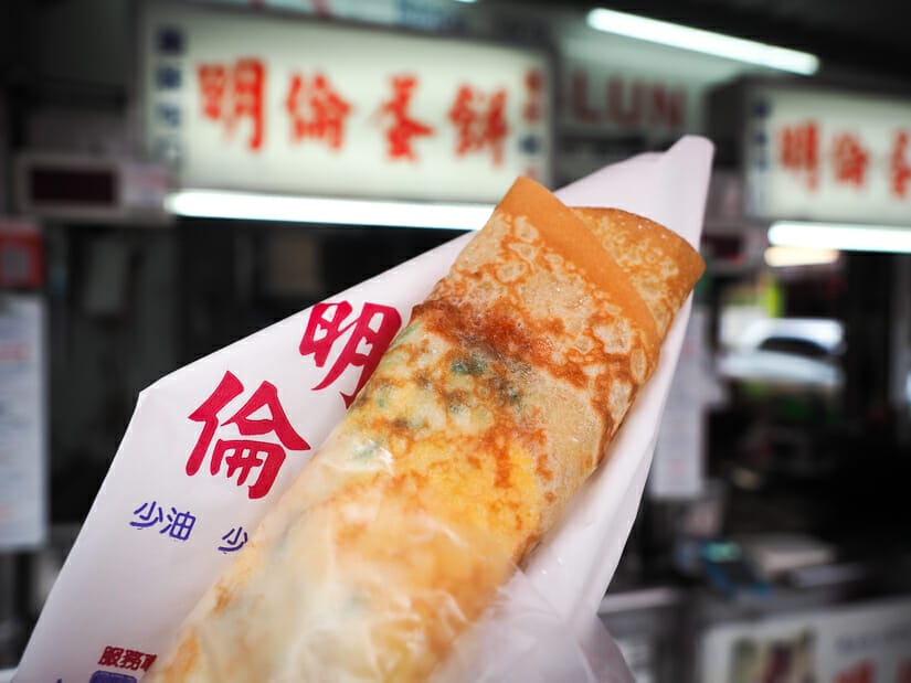 A close up of a breakfast crepe from a famous food stall in Fengchia Night Market Taichung
