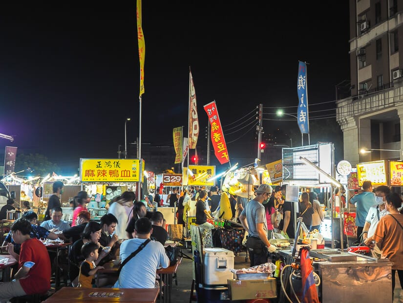 A cluster of food stalls and crowds in Hanxi Night Market in Taichung