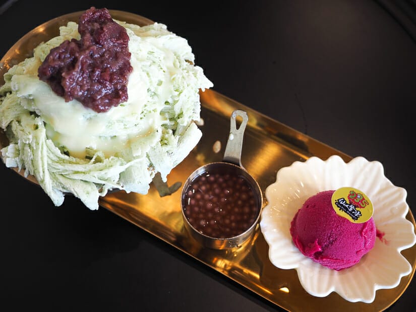 A tray with a seaweed shaved ice and cactus ice cream in Penghu