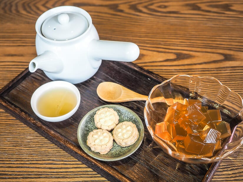 A Taiwanese tea set with tea pot, cup, and snacks, at a teahouse in Ximending