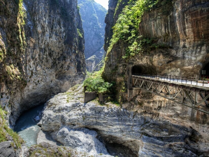 A view of Taroko Gorge, with a bridge entering two tunnels in the mountain