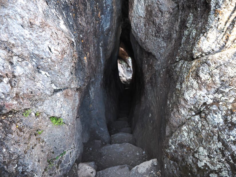 A narrow tunnel at Pisac ruins