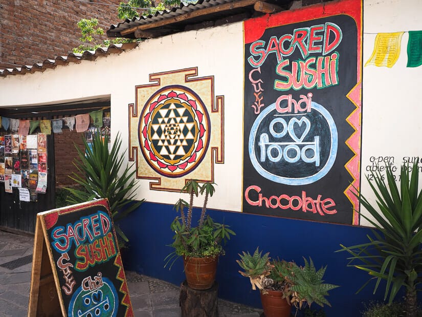 Exterior and sign at Sacred Sushi and Curry Sundays in Pisac