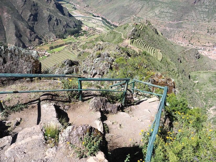 A stair case going steeply downhill from a high viewpoint at the Pisac ruins