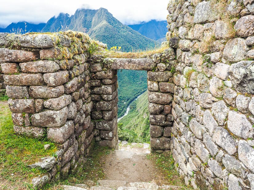 Looking down through a stone gate at Wiñay Wayna ruins
