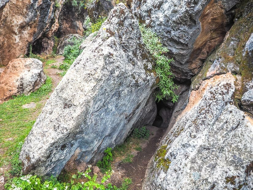 A small cave between large rocks at Zona X ruins around Cusco