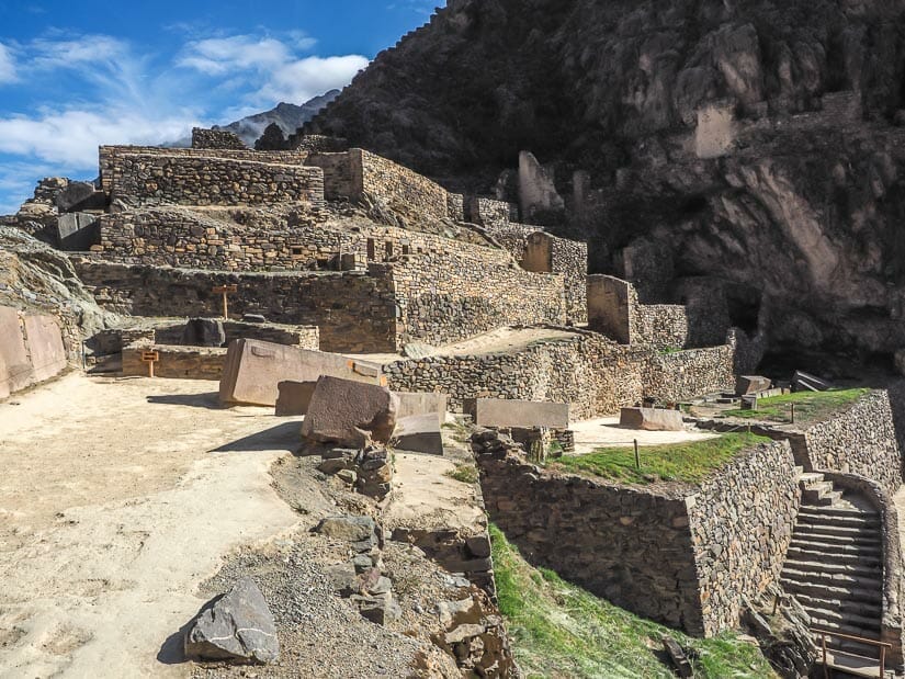 Collection of stone Inca ruins called Military Zone at the top of the terraces at Ollantaytambo