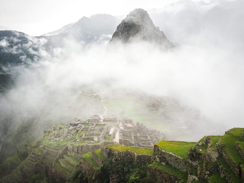 Machu Picchu mostly covered in clouds