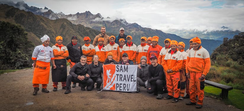 Group photo of trekkers and porters from Sam Travel Peru 