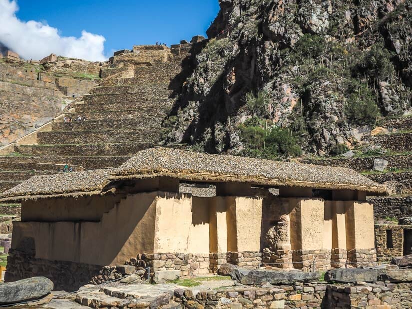 Exterior of the water temple, with Ollantaytambo ruins visible behind