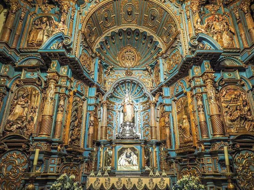 A blue and gold altar inside the Lima Cathedral