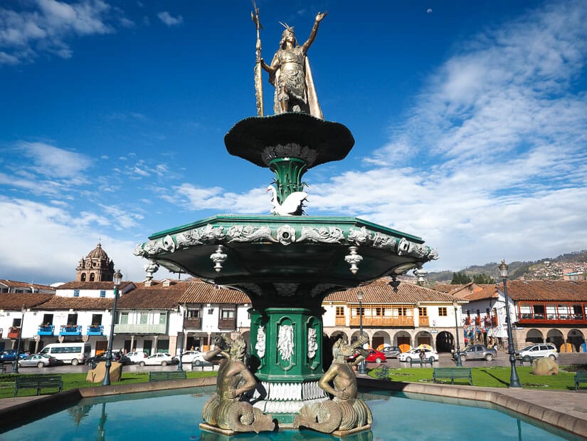 Bronze statue of Pachacutec Inca above a fountain in the Cusco Plaza de Armas