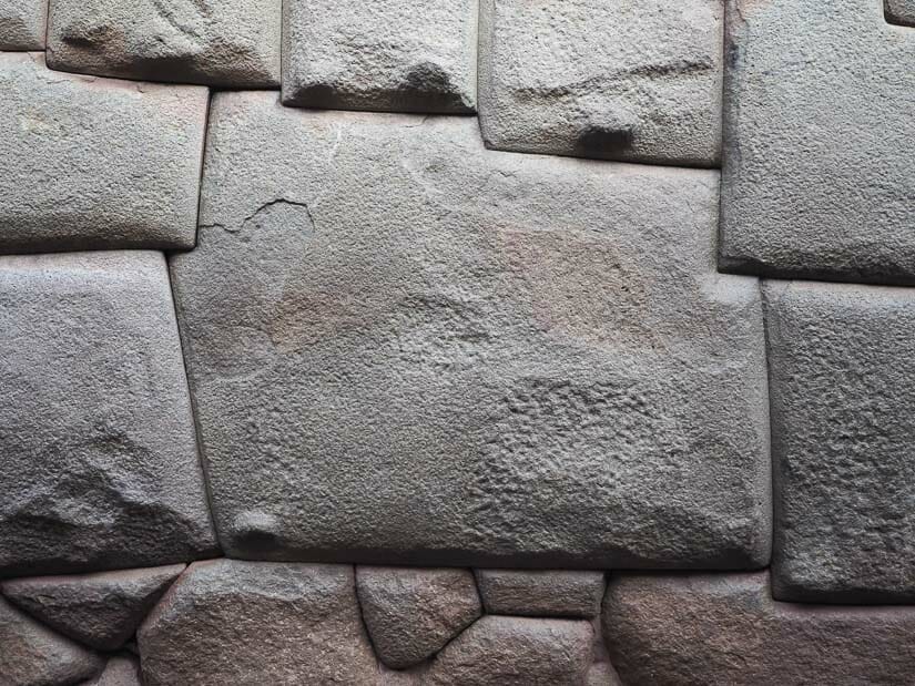 Close up of a large stone in a Inca wall with 12 angles 