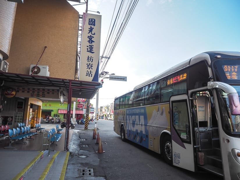 A Kenting bus parked at a bus stop