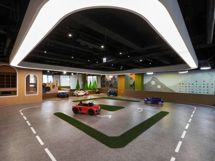 A children's car driving track in a hotel children's playroom