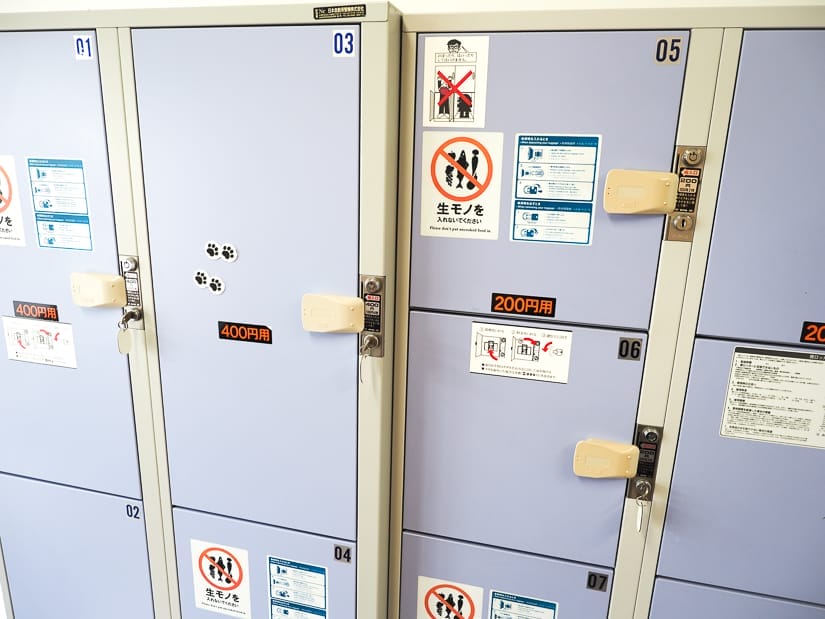 Some large and small luggage storage lockers with light purple color inside the Tashirojima ferry terminal in Ishinomaki