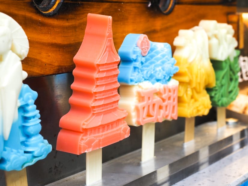 Close up of some models of popsicles shaped like pagodas and other things