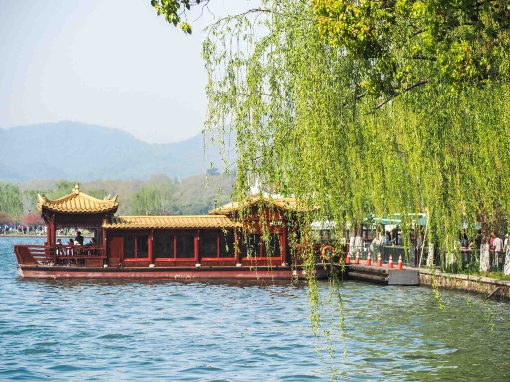 A boat docked at the side of West Lake in Hangzhou
