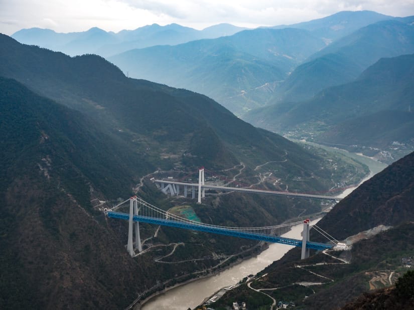 Looking down on Tiger Leaping Gorge from far above, with two bridges across it